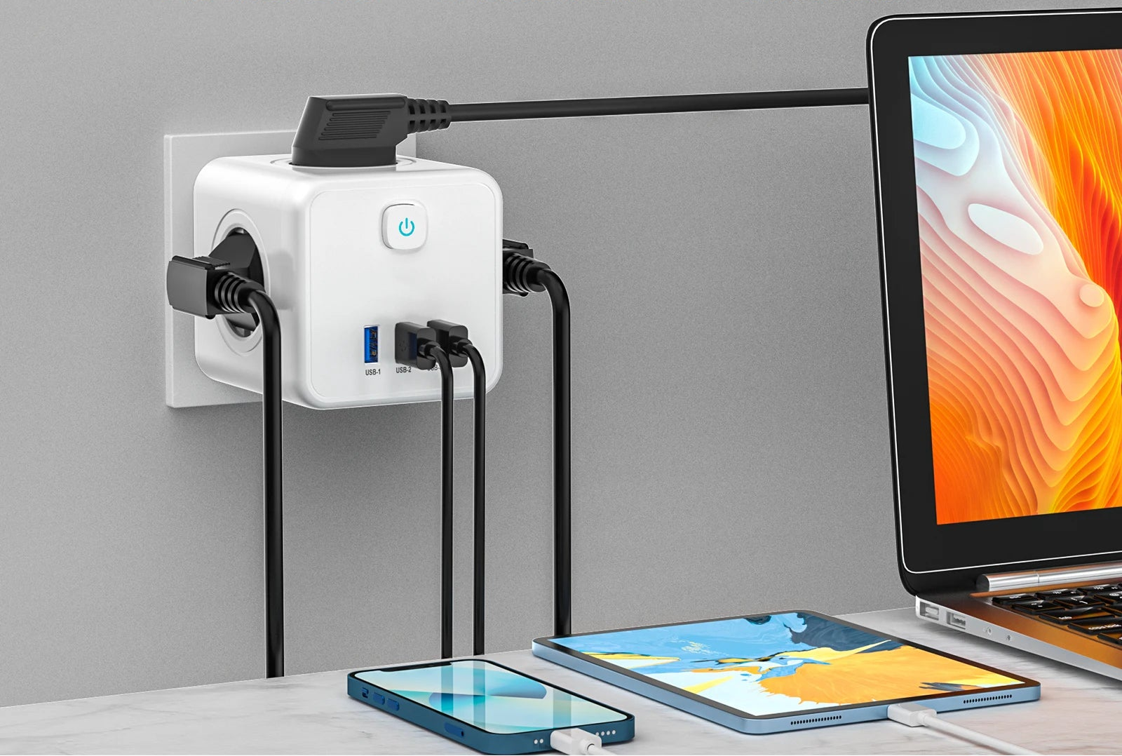 7-in-1 power strip with multiple outlets and USB ports next to a laptop and smartphones on a desk.