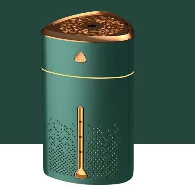Green humidifier with gold accents on a green background, featuring the Xiaomi logo.