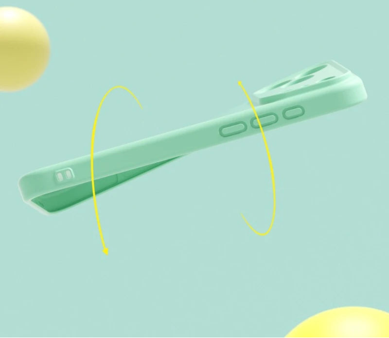 Green plastic tool with yellow lines on a light blue background
